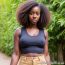 Sexy Black Beauty in a Tight Sleeveless Tease